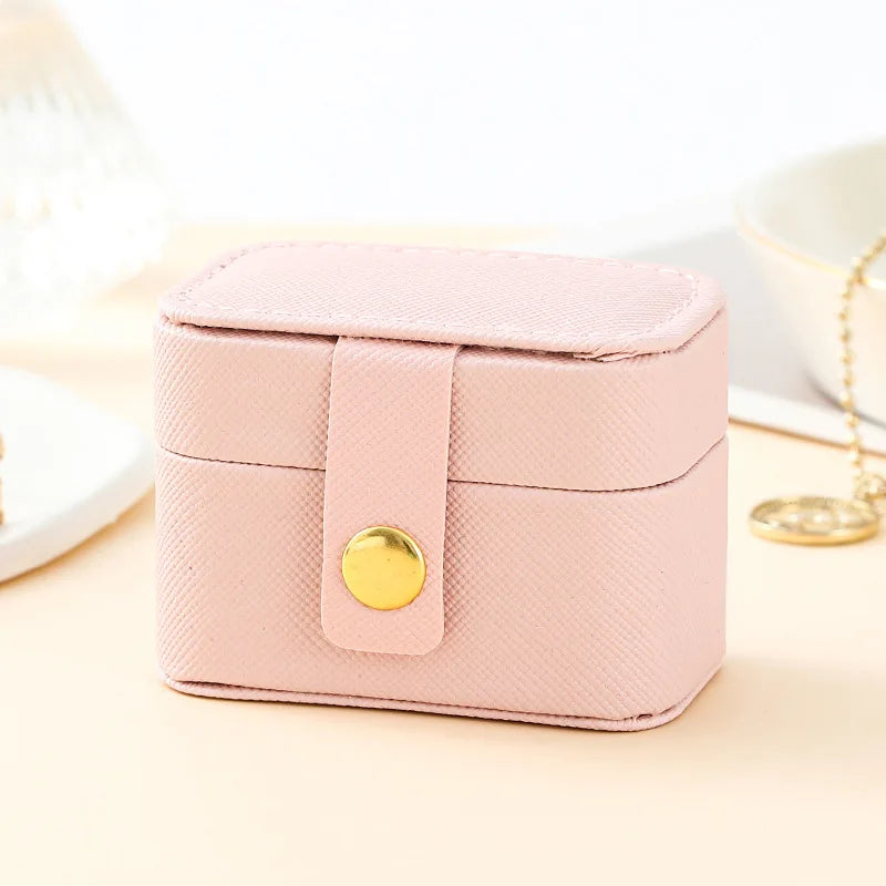Mini boîte à bijoux compacte coloris rose